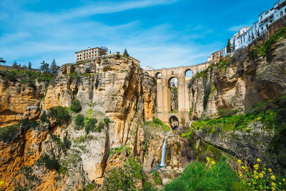 the famous stone bridge over the gorge of tajo in Ronda, Andalusia, Spain