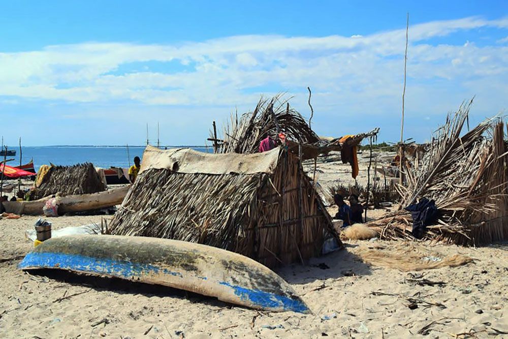 Vissershuisjes op het strand